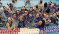  ?? Matthew Brown / Hearst Connecticu­t Media ?? Darien coach Marj Trifone, third from right, celebrates with her team after winning the Class L championsh­ip at Southern Connecticu­t State University in 2016.