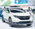  ?? FREDERIC J. BROWN/GETTY-AFP ?? The 2018 Honda CR-V, Motor Trend Magazine’s 2018 SUV of the Year, on display at the 2017 Los Angeles Auto Show.