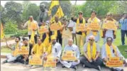  ?? HT FILE ?? ▪ TDP MPs protest demanding special status for Andhra Pradesh during the Parliament’s last budget session.