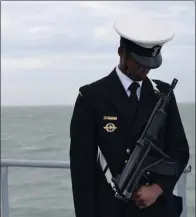 ?? PICTURE: KEVIN RITCHIE ?? A naval officer takes part in a memorial service for the SS Mendi crew.