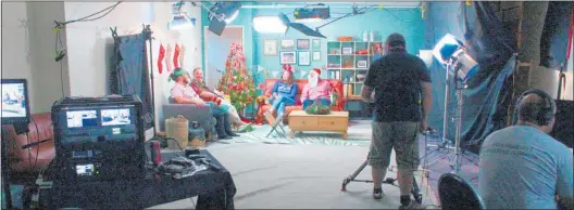  ?? Photo / Dean Taylor ?? Producing a Christmas special video episode of Taringa at Te Wa¯ nanga o Aotearoa’s Te Ipurau Media Unit. On screen, from left, are original presenter Lyndsay Snowden, presenter Paraone Gloyne, new presenter Erica Sinclair and guest Te Wa¯ nanga o Aotearoa Te Taiurungi / chief executive Te Ururoa Flavell.