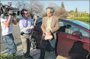  ?? JONATHAN ALCORN / BLOOMBERG ?? Dorian Nakamoto, identified by Newsweek as the founder of Bitcoin, is approached by members of the media in Temple City, Calif., on Thursday.