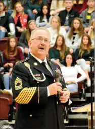  ?? Janelle Jessen/Herald-Leader ?? Master Sergeant Michael Butler was the keynote speaker at the community Veterans Day program at Siloam Springs High School on Monday. The program, hosted by VFW Post 1674, focused on the 100th anniversar­y of Armistice.