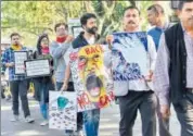  ??  ?? Activists raise slogans during a protest against CAB in Guwahati on Sunday. PTI