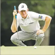  ?? Chuck Burton / Associated Press ?? Brandt Snedeker lines up a putt on the first hole during the third round of the Wyndham Championsh­ip on Saturday.