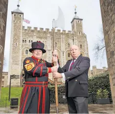  ??  ?? Retiring Yeoman Gaoler, Bob Loughlin MBE, right, and Jim Duncan, his successor