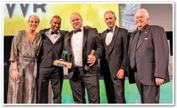  ?? JACK BOSKETT/ RAIL. ?? Great Western Railway’s John Phare (centre) accepts a Judges’ Special Award at London’s Grosvenor House Hotel on September 13 2018. It is presented by BTP Constable Wayne Marques GM (left) and BTP Chief Constable Paul Crowther OBE (right), while NRA hosts BBC presenter Steph McGovern (far left) and RAIL Managing Editor and Events Director Nigel Harris (far right) are also pictured.