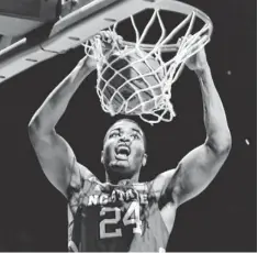  ?? BRIAN SPURLOCK, USA TODAY SPORTS ?? T.J. Warren dunks during N.C. State’s win against Xavier in an NCAA tournament First Four game. He finished with 25 points.