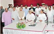  ?? PTI ?? Odisha Governor S C Jamir and Chief Minister Naveen Patnaik with new cabinet ministers after the swearing-in ceremony at Raj Bhawan in Bhubaneswa­r