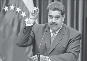  ?? ARIANA CUBILLOS/AP ?? President Donald Trump has accused Venezuela’s President Nicolas Maduro of bankruptin­g the Venezuelan people.