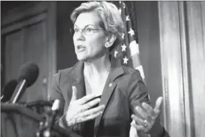  ?? AP ?? Sen. Elizabeth Warren, D-mass., speaks about a bill to cancel student loan debt on Tuesday on Capitol Hill in Washington.