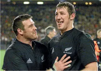  ?? STUFF ?? All Blacks prop Dave Hewett with Chris Jack after a Bledisloe Cup test win over Australia in 2002.