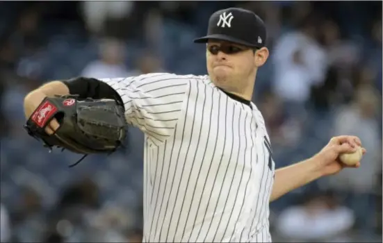  ?? BILL KOSTROUN — THE ASSOCIATED PRESS ?? New York’s Jordan Montgomery delivers a pitch during Monday’s game against the Chicago White Sox at Yankee Stadium.