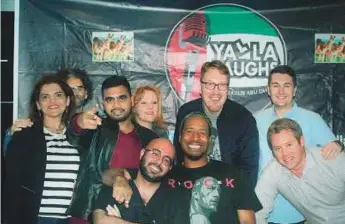  ?? Courtesy: Yalla Laughs Comedy ?? ■ Members of the Yalla Laughs Comedy club along with founders Jonathon D. Boulton from Britain and Erik Thronquist from the US.