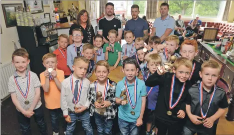  ?? Photograph­s: Iain Ferguson, alba.photos ?? Fort William FC P3 and P4 teams pictured along with their coaches.