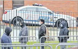  ?? Picture: AP ?? Patients maintain social distancing before entering a COVID-19 testing site at Elmhurst Hospital Center in New York.