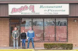  ?? H John Voorhees III/Hearst Connecticu­t Media ?? Ben Vrenezi, left, and Kelly and Jason LaReau have partnered to open a new restaurant on Germantown Road in the former Augie’s Numero Restaurant space in Danbury on March 6.