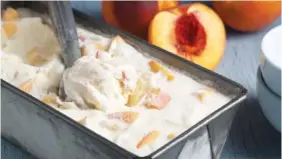  ?? GETTY IMAGES ?? The fresh peaches in this image are a bit chunkier than the recipe calls for, but it’s doubtful you’d hear any complaints from anyone who digs into a dish of it on one of these hot days.