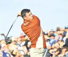  ?? — AFP photo ?? Europe’s golfer Rory McIlroy plays a tee shot during his fourball match during the 42nd Ryder Cup at Le Golf National Course at Saint-Quentin-en-Yvelines, southwest of Paris, in this September 29, 2018 file photo.