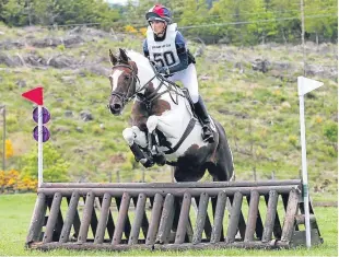  ?? Picture: Jim Crichton ?? Joint winners of the 75cms Eventers Challenge at Foresterse­at were Rachel Fagan and Warchant.