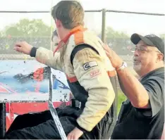  ?? SUPPLIED ?? Pete Cosco, right, helps grandson Jordan Cosco out of Sportsman race car in this file photo. Pete Cosco, who along with wife Linda purchased New Humberston­e Speedwayin 2004, died of a brain aneurysm at age 60 in August 2014.