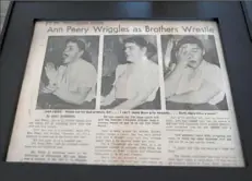  ?? Pam Panchak/Post-Gazette ?? A framed newspaper article focuses on Ann Peery’s role cheering her brothers on to wrestling glory.
