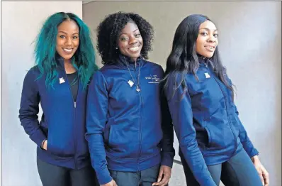  ?? THE ASSOCIATED PRESS] [PATRICK SEMANSKY/ ?? The members of the first Nigerian women’s bobsled team are American-born but say they represent the culture they were raised in. From left are Akuoma Omeoga, Seun Adigun and Ngozi Onwumere.