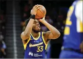  ?? SHAE HAMMOND — BAY AREA NEWS GROUP FILE ?? Golden State Warriors center James Wiseman underwent an orthobiolo­gic injection in his arm in April on a trip to London with general manager Bob Myers, a source confirmed.
