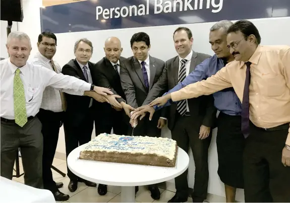  ?? Photo: Losirene Lacanivalu ?? Attorney-General and Minister for Economy Aiyaz Sayed-Khaiyum (centre) with Fiji Institute of Bankers council members. From left Kevin McCarthy Bank South Pacific Limited, Ariff Ali Reserve Bank of Fiji, Frederic Reynaud of BRED Bank (Fiji) Limited,...