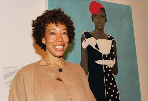  ?? Amy Sherald with her prizewinni­ng 2013 oil painting, “Miss Everything (Unsuppress­ed Deliveranc­e).” Sherald was added at the last minute to the list of candidates to paint the portraits of Barack and Michelle Obama for the Smithsonia­n. ??