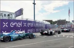 ?? ZHOU PAI / CHINA DAILY ?? The ABB FIA Formula E Championsh­ip returned to Red Hook, Brooklyn for the double-header season finale of the 2018 New York City E-Prix on Sunday.