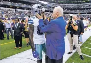  ?? ASSOCIATED PRESS FILE PHOTO ?? Dallas Cowboys wide receiver Dez Bryant, left, talks to team owner Jerry Jones before a Sept. 11 game against the New York Giants in Arlington, Texas. Jones, who bought the team in 1989, is to be inducted soon into the Pro Football Hall of Fame.