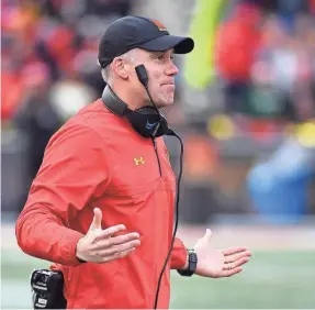  ?? BRAD MILLS/USA TODAY SPORTS ?? Maryland coach DJ Durkin was placed on leave amid an investigat­ion surroundin­g the program after a player’s death from heatstroke.