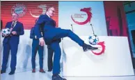  ?? JOHANNES EISELE / AFP ?? Karl-Heinz Rummenigge, chairman of FC Bayern Munich soccer club, opens the team’s first China office in Shanghai on Wednesday. The team sees many opportunit­ies in China.