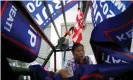  ?? Photograph: Aly Song/Reuters ?? A worker at Jiahao flag factory in China makes flags for Donald Trump’s ‘Keep America Great!’ 2020 re-election campaign.