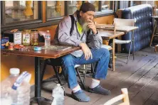  ?? Jessica Christian / The Chronicle ?? Instead of evacuating, Brent White of Ben Lomond stayed to watch over La Placa Family Bakery and other businesses.