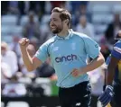  ??  ?? England’s Chris Woakes celebrates dismissing Dhananjaya Lakshan