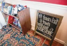  ?? Elizabeth Conley/Staff file photo ?? A sandwich board inside the River Oaks Bookstore on Nov. 15, 2020, says it all. After nearly 47 years, the locally owned store at 3270 Westheimer permanentl­y closed at the end of that year.