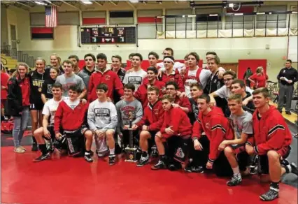  ?? JEFF STOVER - DIGITAL FIRST MEDIA ?? Boyertown poses with the championsh­ip trophy after winning the Brian Bealer Memorial Bear Duals Saturday afternoon.