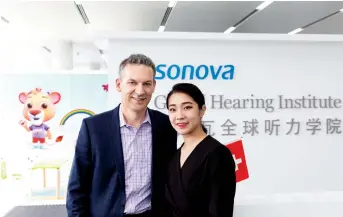  ??  ?? On his first visit to China as CEO, Arnd Kaldowski meets Jiaojiao, a dancer who is suffering from profound hearing loss since childhood. She is now Sonova’s brand ambassador in China.