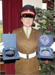  ??  ?? ●● Rct Stephanie Barker with her awards