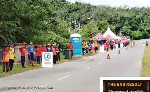  ?? FOR many amateur Ironman athletes, there’s indescriba­ble satisfacti­on in simply completing the race.
As I stood near the finish line at Meritus Pelangi Beach Resort & Spa Langkawi, I overheard one finisher with a Sarawak flag quietly saying to himself, “ ??