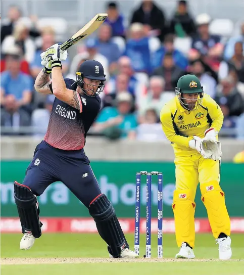 ??  ?? Aggressive: Ben Stokes scores runs on the offside off the bowling of Australia’s Travis Head, as wicketkeep­er Matthew Wade looks on at Edgbaston
