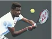  ?? ROBERT PREZIOSO, GETTY IMAGES ?? Frances Tiafoe, above, plays Mikhail Kukushkin in a firstround match Tuesday.