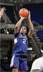  ?? Associated Press ?? UConn’s Tristen Newton shoots against DePaul during the first half on Jan. 31 in Chicago.