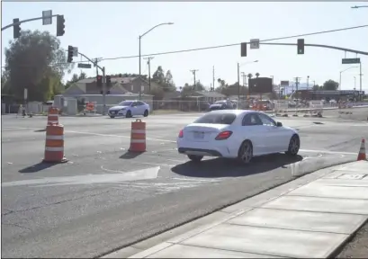  ?? JULIO MORALES PHOTO ?? Vehicles take a detour at V.V. Williams Street in Calexico on Tuesday as a result of ongoing constructi­on related to the Highway 98 widening project. The constructi­on project is anticipate­d to be completed by the end of the year, or early next year.