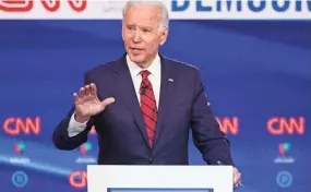  ?? EVAN VUCCI/AP FILE ?? As former Vice President Joe Biden tries to attract his party’s left wing, he must keep a firm grip on his centrist image.