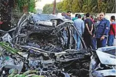  ?? AP ?? The remains of a car hit by a shelling by the Jaish Al Islam rebel group in Rabwa neighbourh­ood of Damascus yesterday.