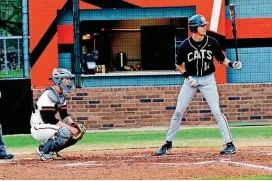  ?? [PHOTO BY STEVE SISNEY, THE OKLAHOMAN] ?? Norman High catcher Justin Cook, left, and Southmoore’s Conner Uselton, pictured at right, will team up in the large-school All-State baseball game. The small-school game will begin at 4:30 p.m. The large-school game starts at 7. Both games will be...