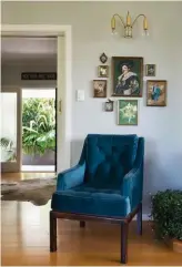  ??  ?? ABOVE Banquette seating in the dining room does double duty as storage. Melle covered the squabs and cushions in gold velvet fabric from Warwick. FAR LEFT The cabinet in the hallway is filled with white vases Melle collected from vintage stores. Above...